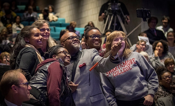 President Valerie Smith posing for selfies